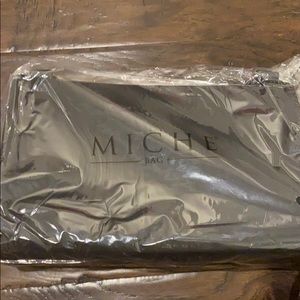 Black Miche bag still in plastic